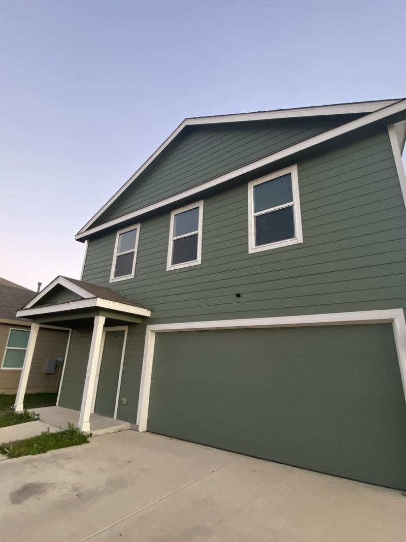 Mosquito screens on two-story home